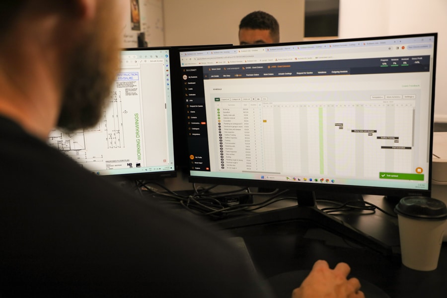 A construction pro checks his project schedule with Buildxact.