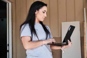 Estimator Stephanie Perez uses Buildxact on the TXN Remodeling N Construction job site.