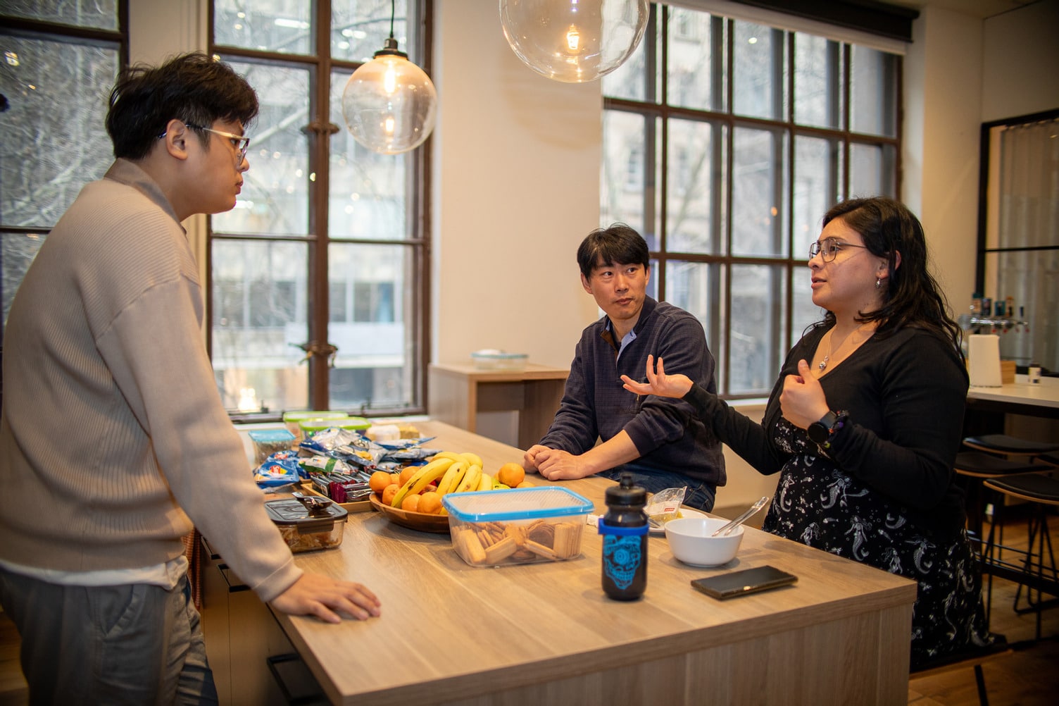 Buildxact team members collaborating in the workplace